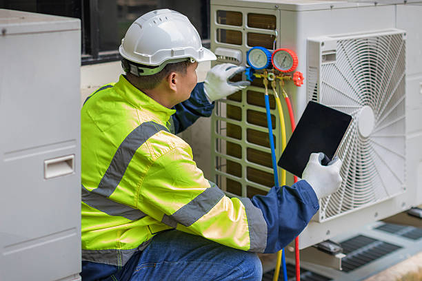 Professional Heat Pump Repair technician working in Jamaica, NY